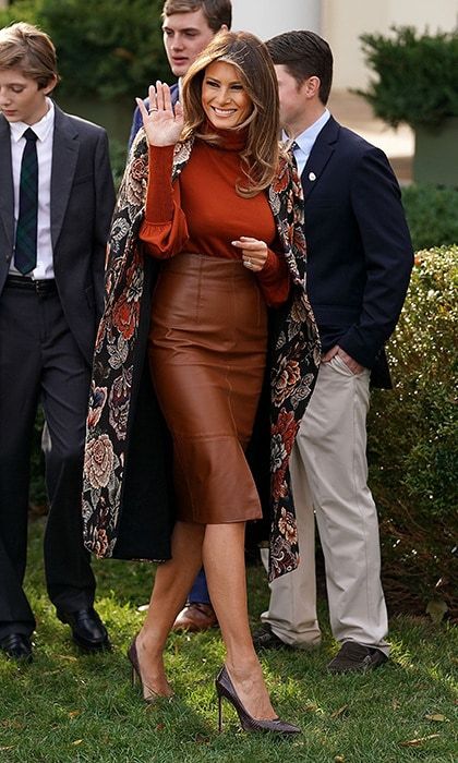 Joining her husband for their first-ever National Thanksgiving Turkey Pardoning Ceremony on November 21, Melania opted for head to toe fall colors. Topping the first lady's burnt orange turtleneck and Herve Pierre brown leather pencil skirt was a luxurious Stella McCartney floral coat.
Photo: Chip Somodevilla/Getty Images