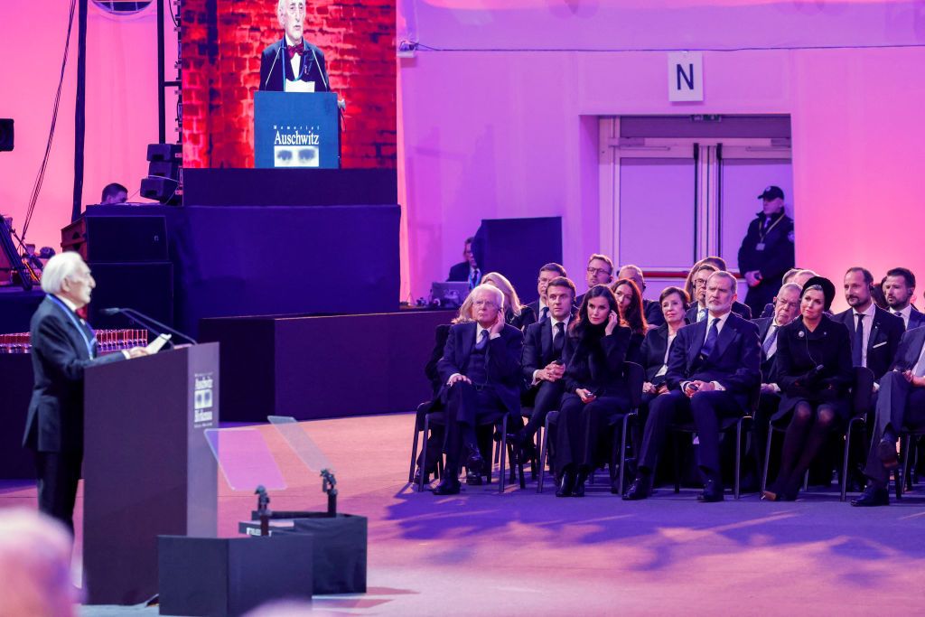 French President Emmanuel Macron (back 2L), Italian President Sergio Mattarella, the French president's wife Brigitte Macron, Queen Letizia of Spain, King Felipe VI of Spain, Queen Maxima of the Netherlands (R) and other guests listen as Leon Weintraub, a concentration camp survivor, delivers a speech during commemorations on the 80th anniversary of the liberation of the German Nazi concentration and extermination camp Auschwitz-Birkenau by the Red Army, in Oswiecim, Poland on January 27, 2025. The camp was set up by Nazi German occupiers in southern Poland in 1940 and liberated by Soviet troops on January 27, 1945 -- just months before the end of the Second World War.