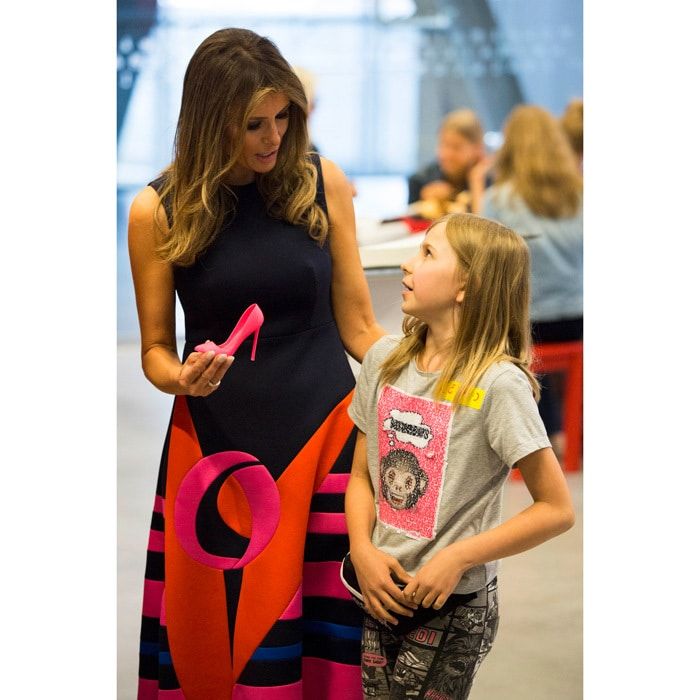 Melania Trump wore a colorful Delpozo dress as she visited the Copernicus Science Center in Warsaw, Poland on July 6. The first lady paired her dress with hot pink Manolo Blahnik heels that were then used in a demonstration to make a miniature shoe from a 3D printer.
Photo: ANDRZEJ HULIMKA/AFP/Getty Images