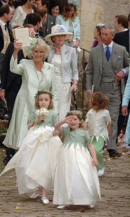 With husband Prince Charles in the background, mother-of-the-bride Duchess Camilla waved to the cheering crowds.
Photo: Getty Images