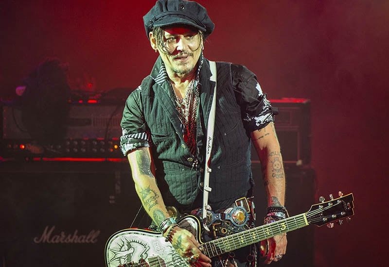 Johnny Depp playing guitar live