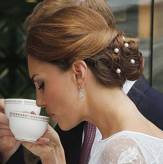 Pearl pins were the perfect touch for this sweet chignon.
<br>
Photo: Getty Images