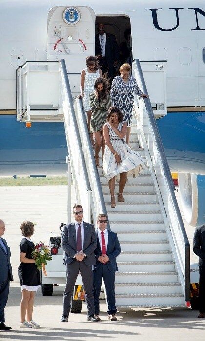 Michelle had a Marilyn Monroe moment as she disembarked Air Force One, holding down her summer dress.
<br>
Photo: Pablo Cuadra/Getty Images