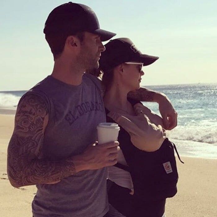 Adam Levine is basking in fatherhood. The singer and his wife Behati Prinsloo stepped out to the beach with their newborn daughter Dusty Rose. Sharing a photo from the family outing, Adam wrote, "Everything I need is right here. (Beach optional)."
Photo: Instagram/@adamlevine