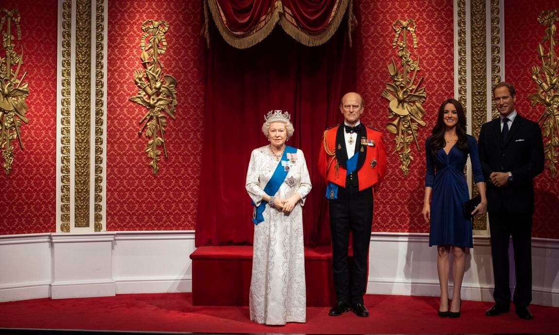 The royal display features the Queen, Prince Philip, Prince William and Kate Middleton