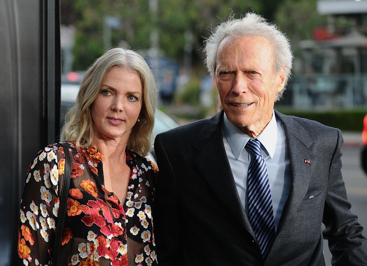 Clint Eastwood and Christina Sandera attend a screening of "Sully" at Directors Guild Of America on September 8, 2016