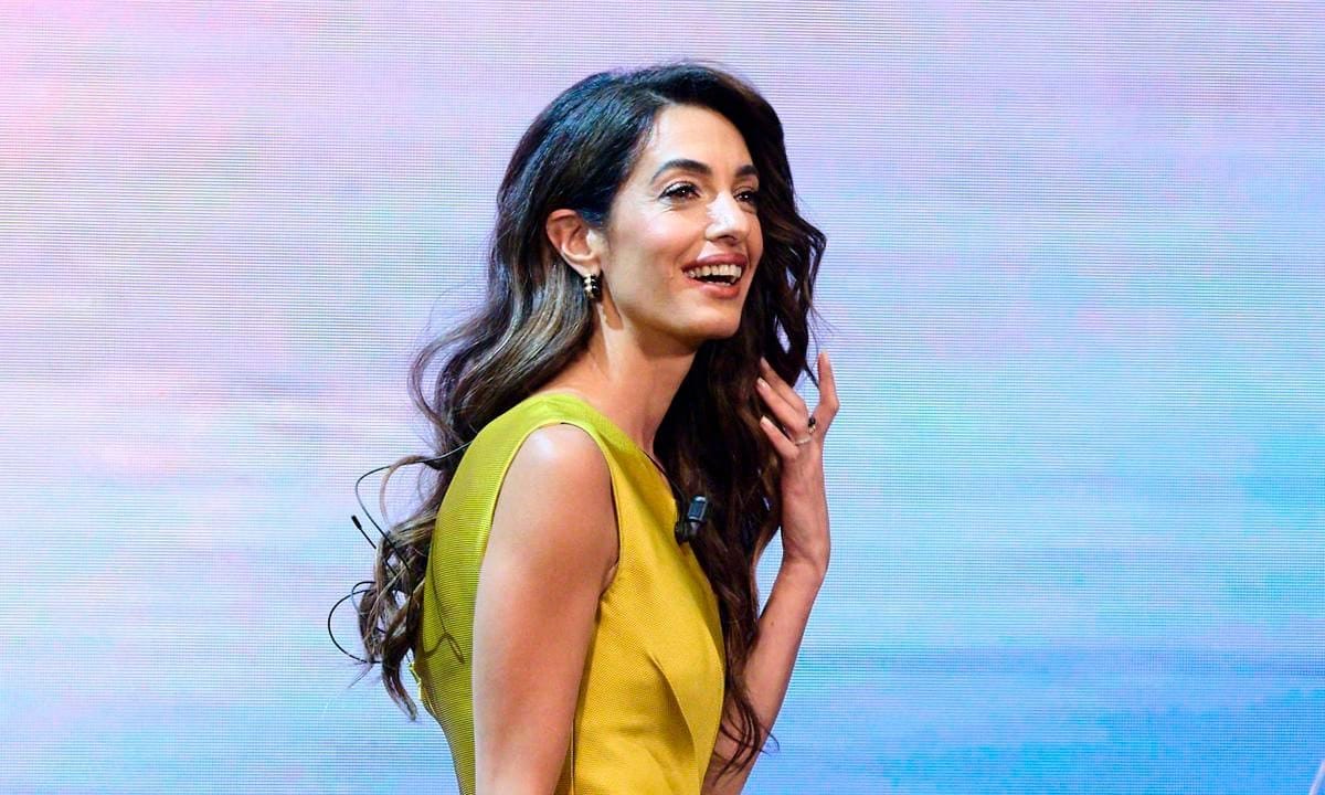 Amal Clooney Attend "We Choose the Earth" In Madrid