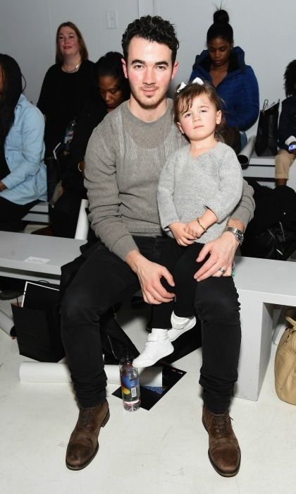 Kevin Jonas' daughter Alena made her very first appearance at fashion week, sitting on her daddy's lap during the Rookie USA fashion show.
Photo: Michael Loccisano/Getty Images for New York Fashion Week: The Shows