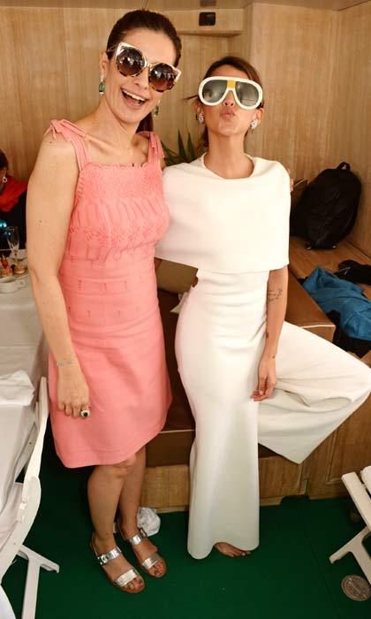 Big glasses don't care! British actor Colin Firth's wife, Livia Firth (left), and Argentine actress Calu Rivero posed together with their oversized sunglasses at a private Chopard lunch on Saturday.
<br>Photo: Getty Images