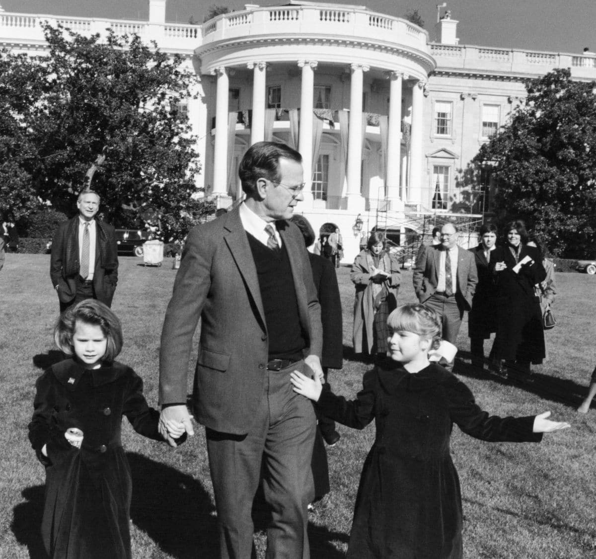 Jenna and Laura Bush with their grandfather and former President, George H. W. Bush