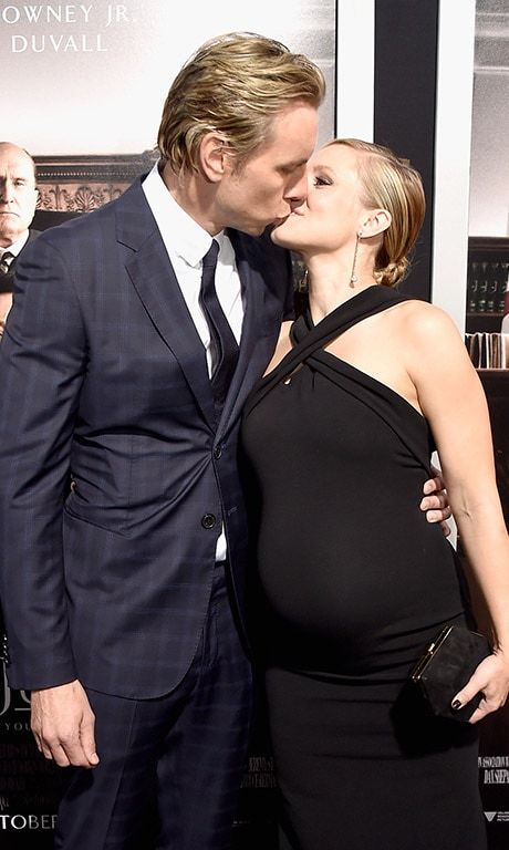 Dax Shepard and a pregnant Kristen Bell kissed at <I>The Judge</I> movie premiere.
Photo: Getty Images