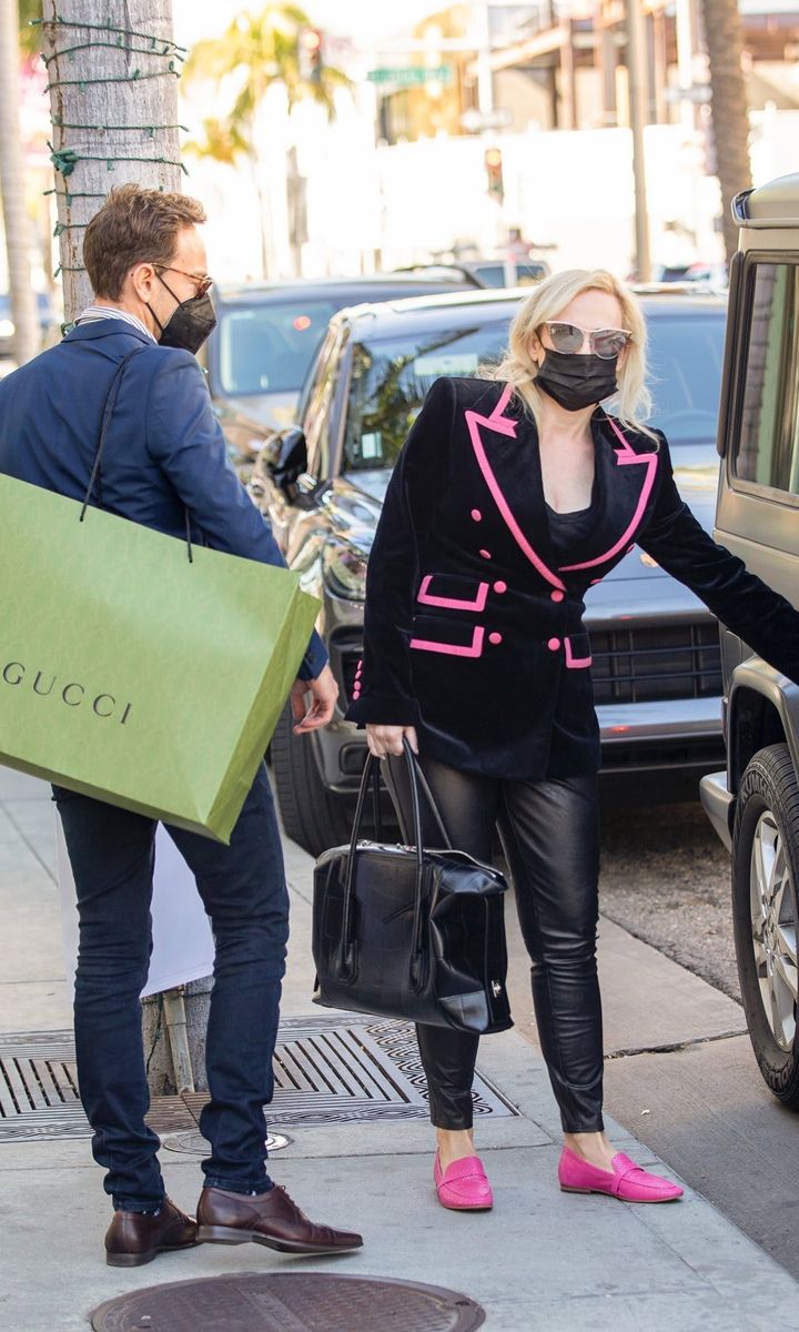 Rebel Wilson with a Gucci shopping bag