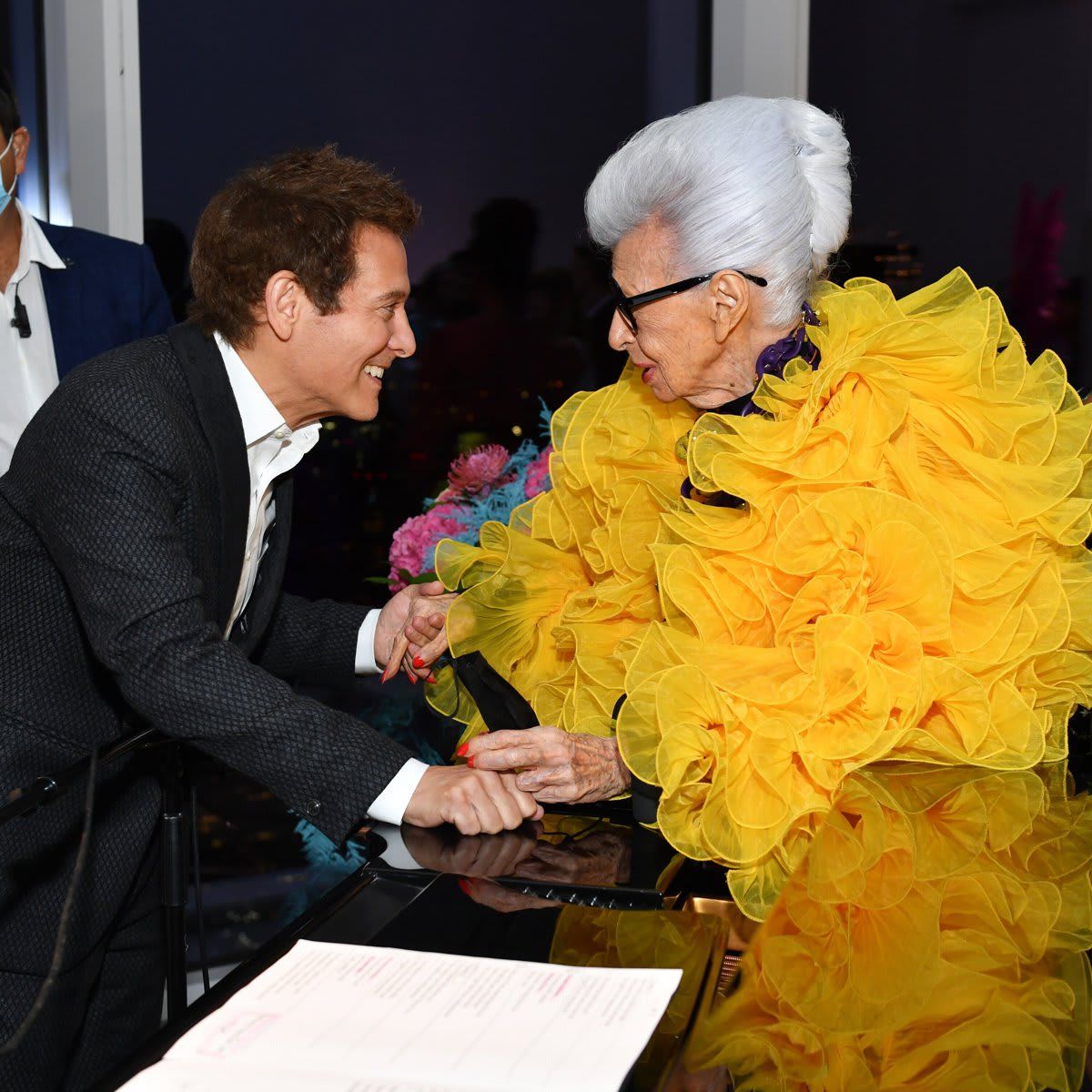 Iris Apfel celebrates her 100th birthday with Katie Holmes, Halle Bailey, Tommy Hilfiger, and more