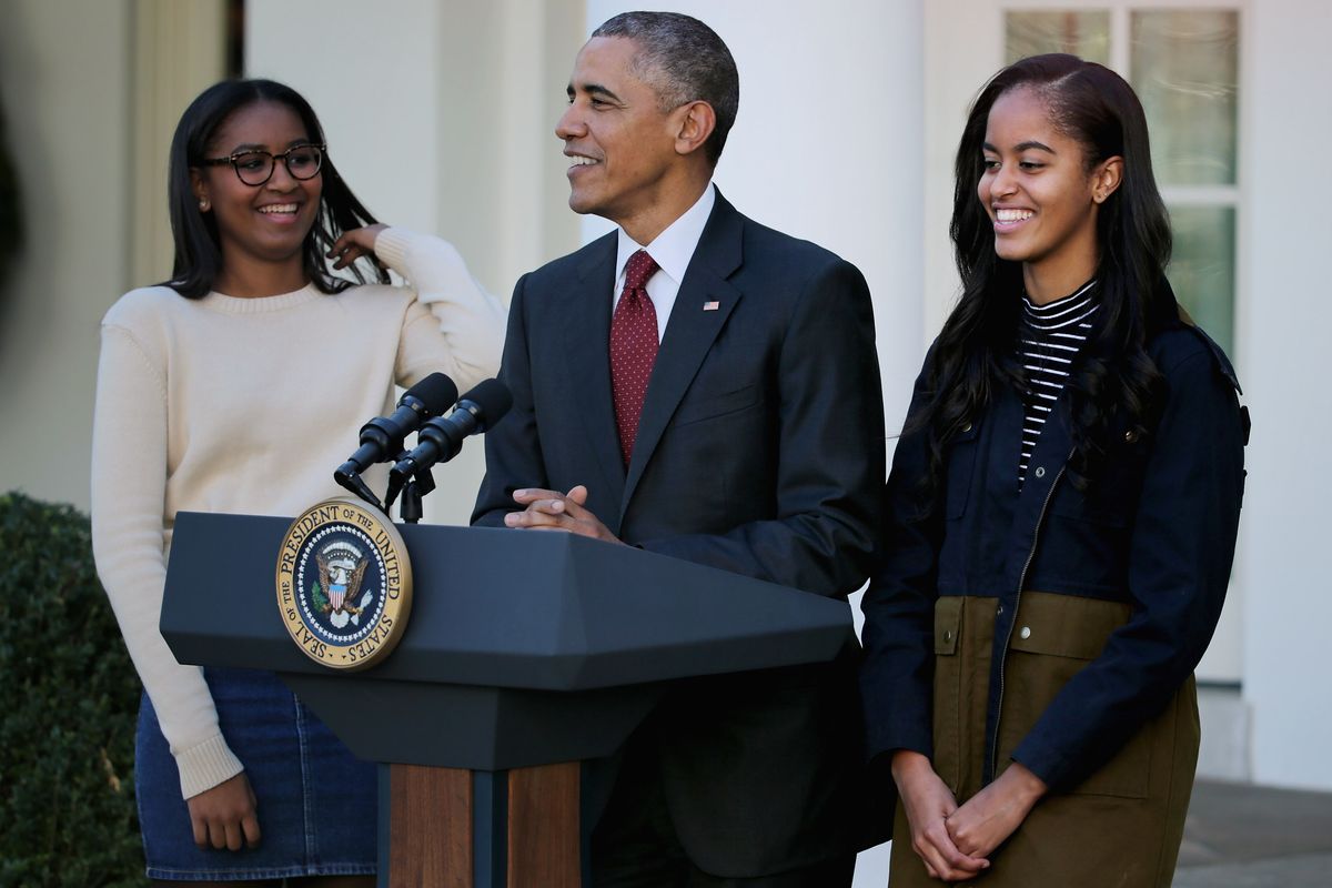 Sasha, Barack, and Malia Obama in 2015