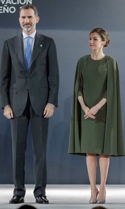 Queen Letizia wearing a cape ensemble