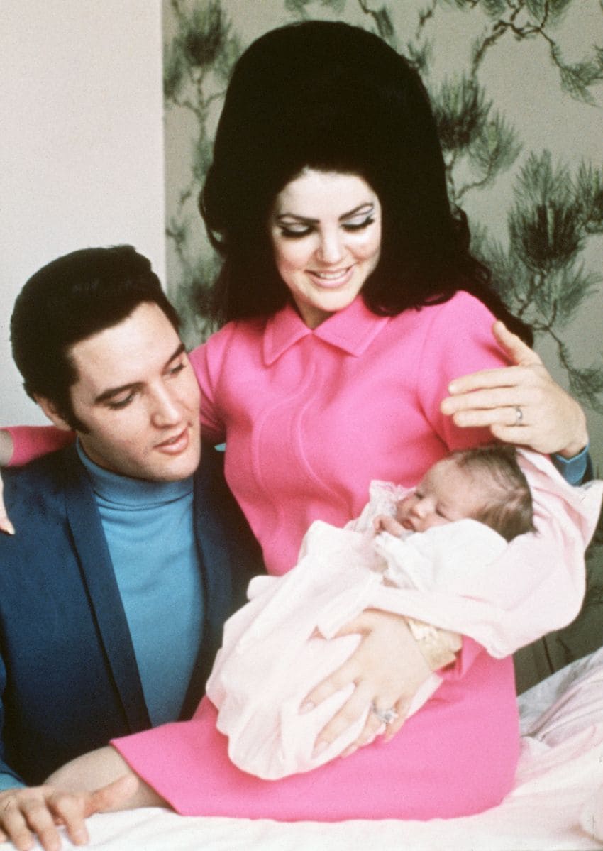 Elvis Presley and his wife, Priscilla, prepare to leave the hospital with their new daughter, Lisa Marie. Memphis, Tennessee, February 5, 1968.