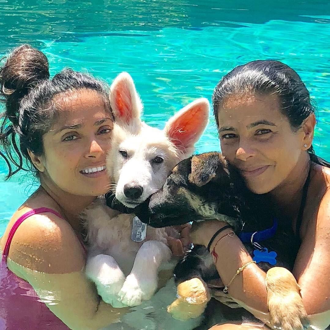 Salma Hayek poses with her pets