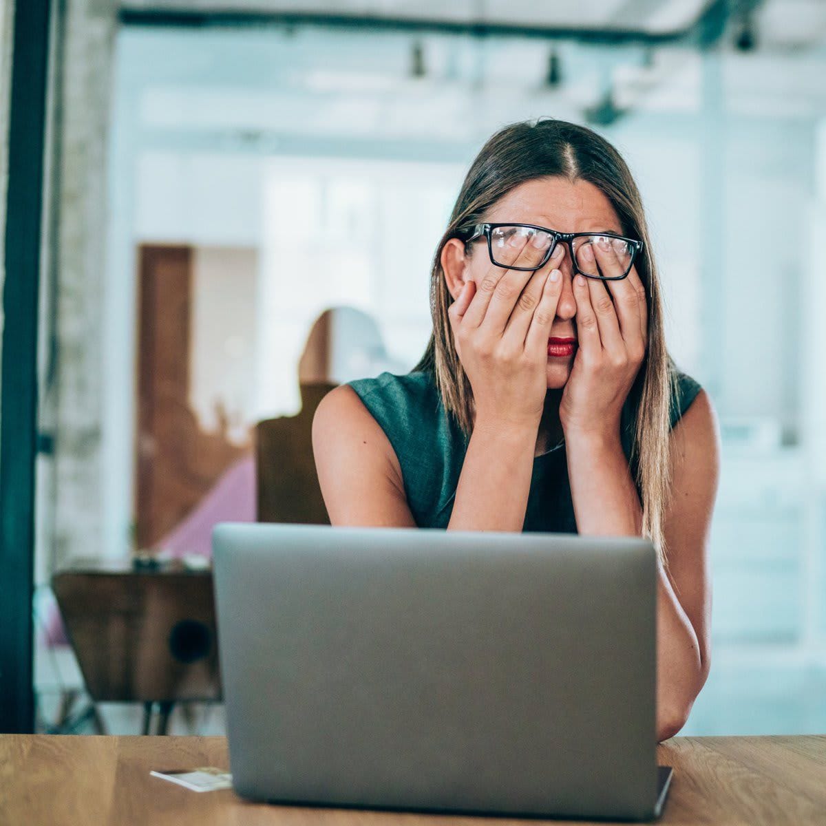 Stress woman at her computer