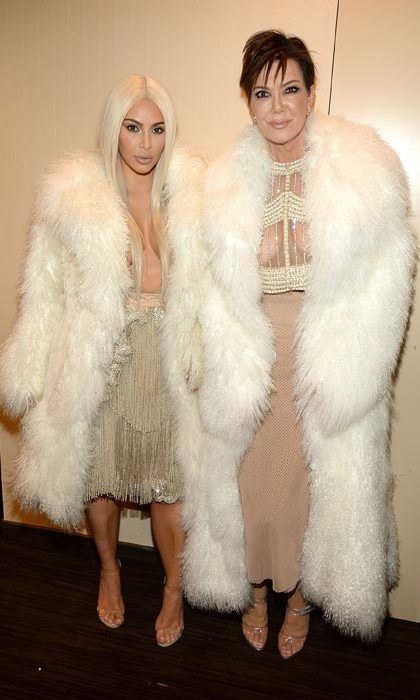 Like mother, like daughter. Kris Jenner and daughter Kim both sported oversized furry jackets covering up their cream and sequin dresses.
<br>
Photo: Getty Images