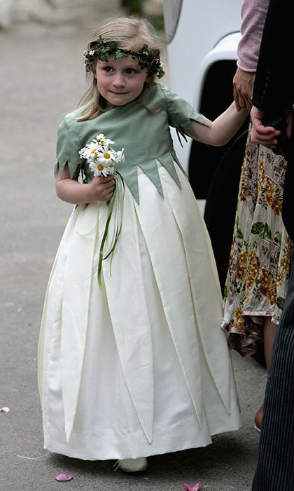 Each tiny bridesmaid held a mini-bouquet of daisies and wore a wreath in her hair.
Photo: Getty Images