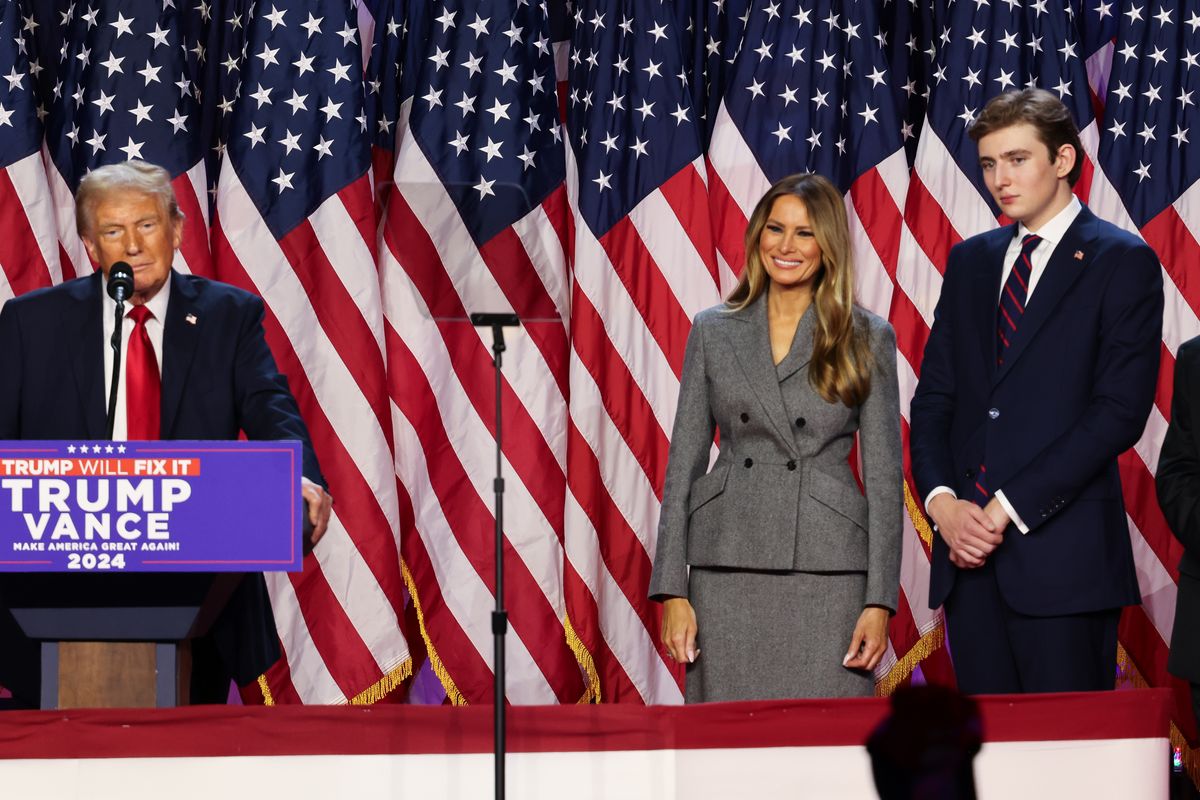  Former US President and Republican presidential candidate Donald Trump (L) and his wife Melania Trump (2nd R) with their son Barron Trump (R) during an election night event at the Palm Beach Convention Center in West Palm Beach, Florida, United States, on November 06, 2024. (Photo by Brendan Gutenschwager/Anadolu via Getty Images)