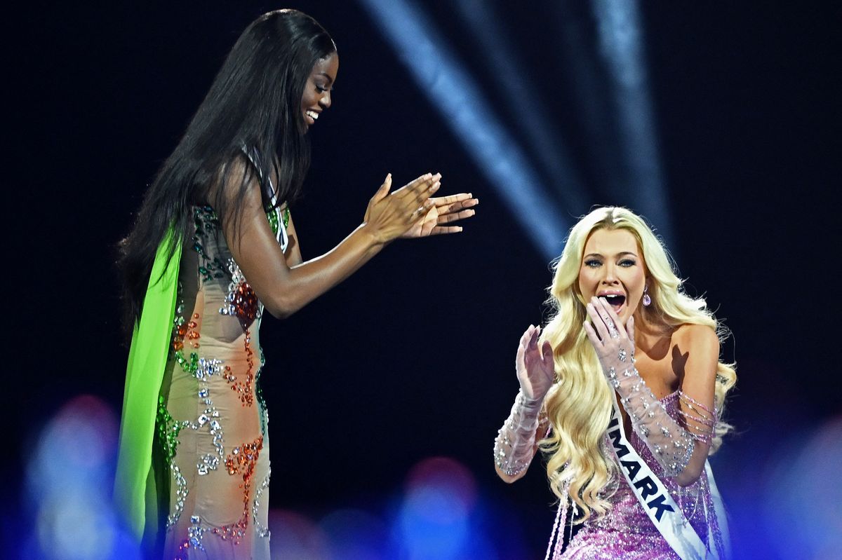 TOPSHOT - The newly crowned Miss Universe 2024, Victoria Kjaer Theilvig (R) from Denmark, reacts next to Miss Nigeria, Chidimma Adetshina, after winning the 73rd edition of the Miss Universe pageant in Mexico City on November 16, 2024. (Photo by CARL DE SOUZA / AFP) (Photo by CARL DE SOUZA/AFP via Getty Images)