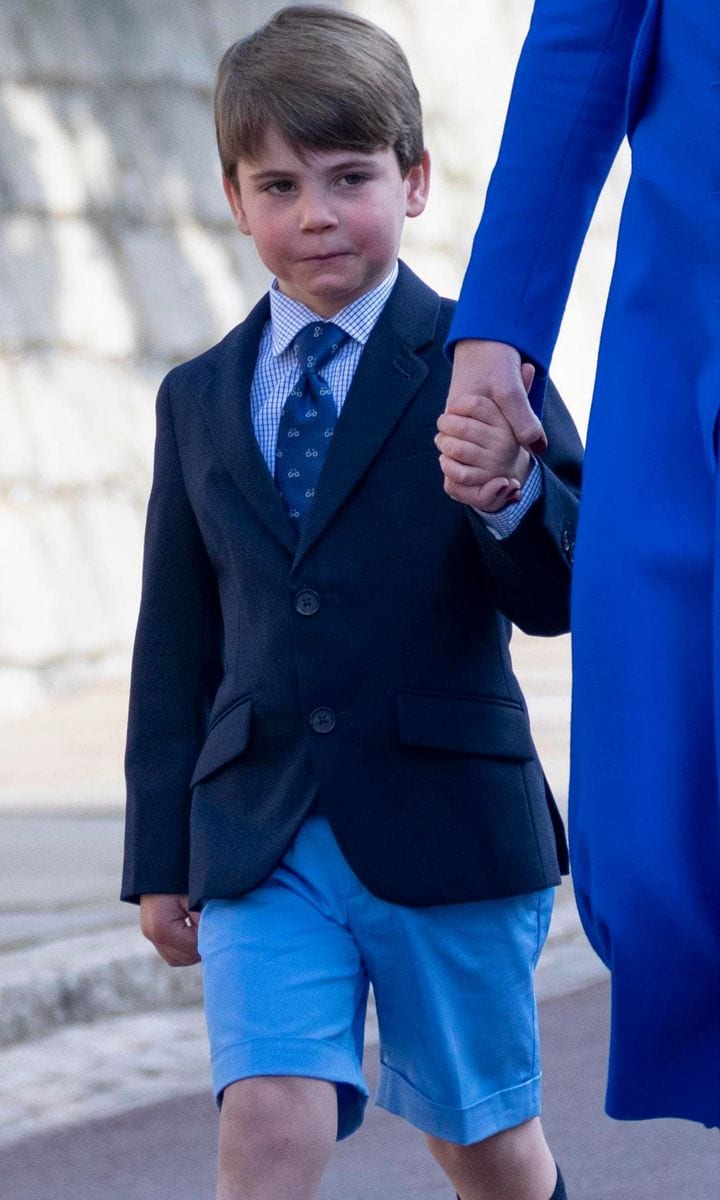 Prince Louis made his debut in 2023 wearing blue shorts and a tie that appeared to feature a bicycle print.