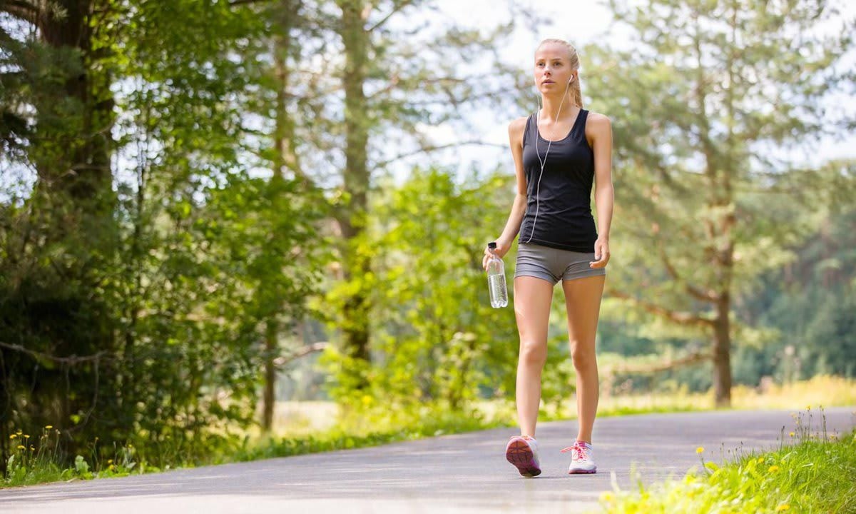 Woman walking in the forest