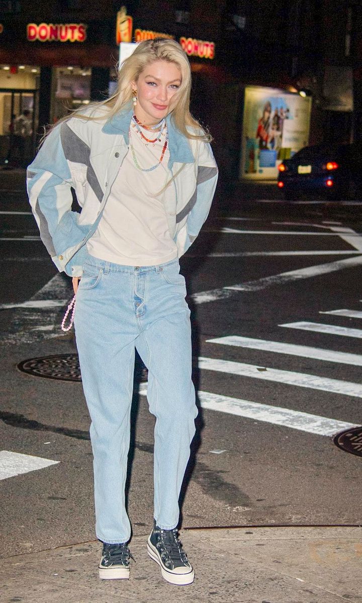 Gigi Hadid rocks a retro faded denim look and she looks amazing in it