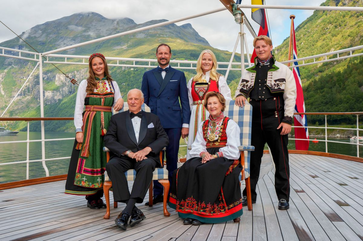 Norway's King Harald, Queen Sonja, Crown Prince Haakon, Crown Princess Mette-Marit, Princess Ingrid Alexandra, Prince Sverre Magnus pose for a group photo aboard the kingship Norway in the Geirangerfjord on August 31, 2024, where they attend Princess Martha Louise of Norway and her future husband Durek Verrett's wedding. Princess Martha Louise, the eldest child of King Harald will tie the knot on Saturday with American self-proclaimed shaman Durek Verrett. (Photo by Cornelius POPPE / various sources / AFP) / Norway OUT (Photo by CORNELIUS POPPE/NTB/POOL/AFP via Getty Images)