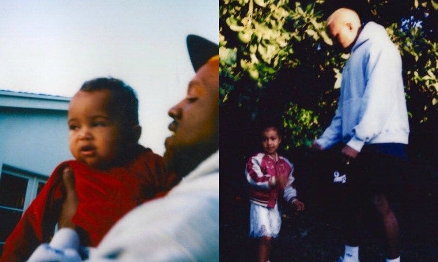 Kanye West showed off his paternal side in new photos released by his wife Kim Kardashian. The rapper held his son Saint close in one photo, while he played outdoors with his stylish daughter North in another.
Photos: kimkardashianwest.com