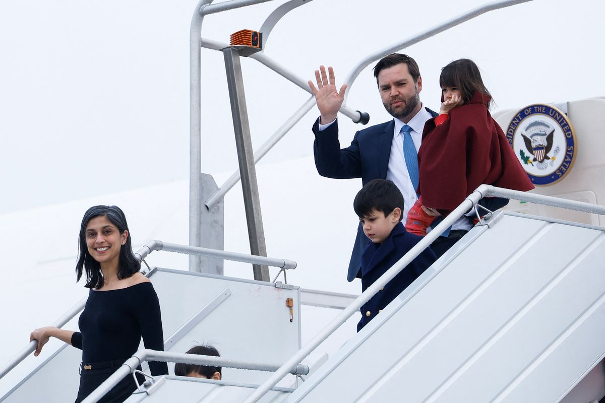 TOPSHOT - US Vice President JD Vance disembarks from the Air Force Two with (from L) his wife Usha Vance and his children Vivek, Ewan and Mirabel as he arrives at Orly airport outside Paris, on February 10, 2025. US Vice President JD Vance is among leading world figures expected at a global summit on artificial intelligence in Paris on February 10 and 11, 2025. (Photo by Ian LANGSDON / AFP) (Photo by IAN LANGSDON/AFP via Getty Images)          