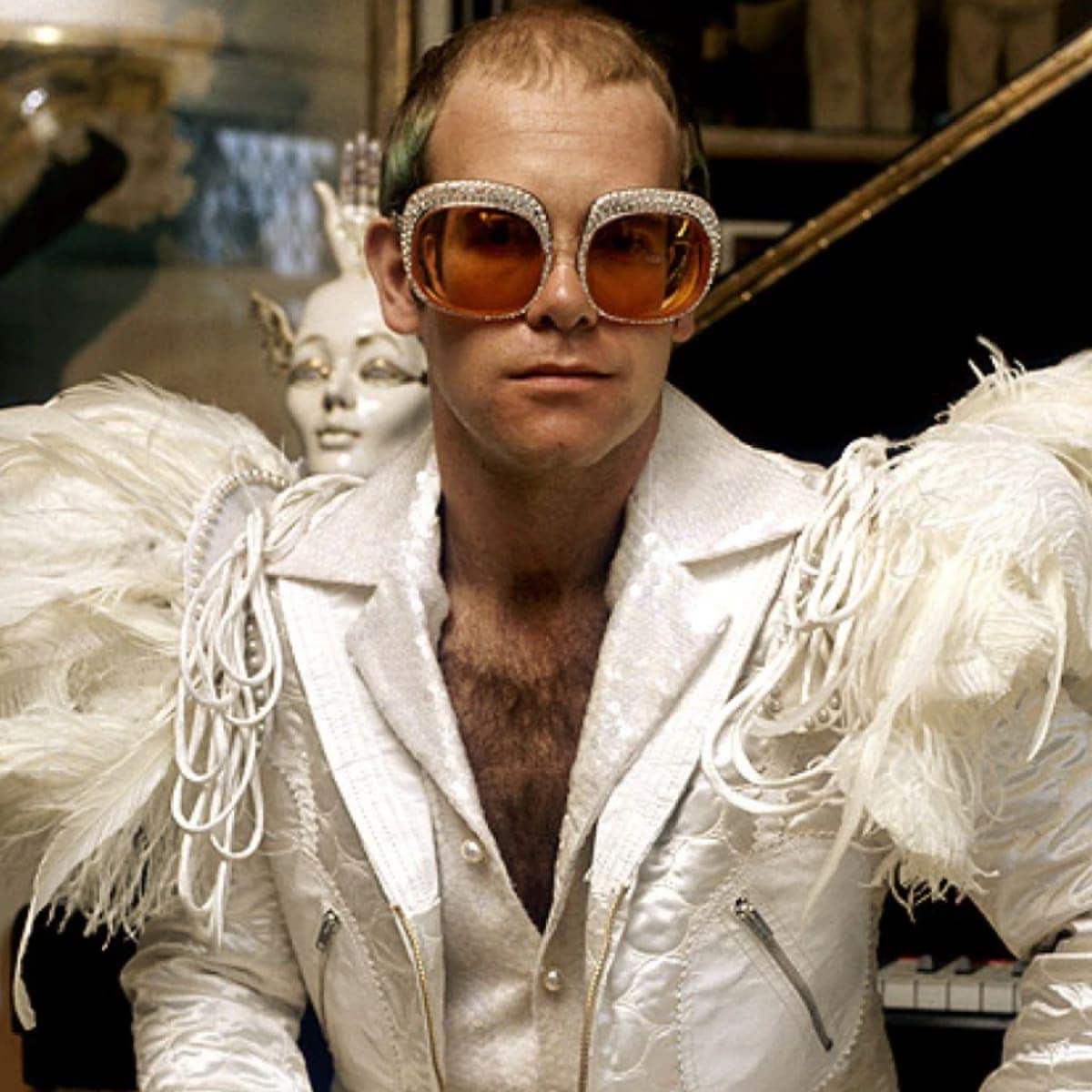 Elton John in one his most iconic looks of all time