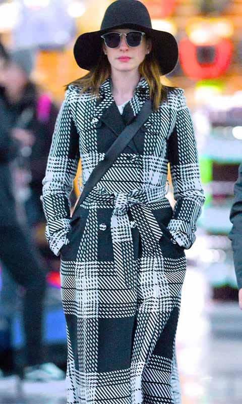 Anne Hathaway wears a tartan coat
