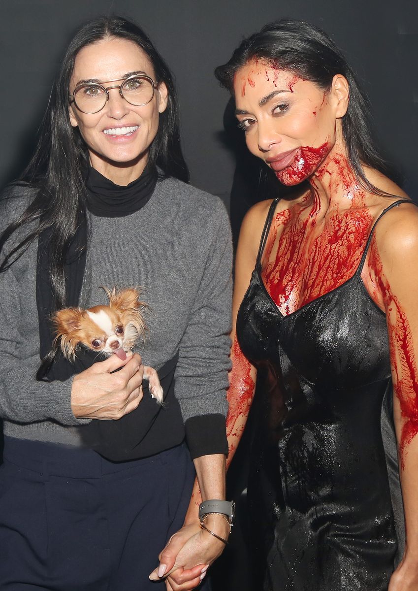 Demi Moore, Pilaf the dog and Nicole Scherzinger as "Norma Desmond" pose backstage at the Jamie Lloyd production of Andrew Lloyd Webber's "Sunset Blvd" on Broadway at The St. James Theatre on October 16, 2024 in New York City.  (Photo by Bruce Glikas/WireImage)