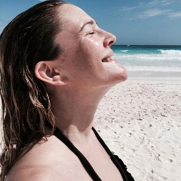 Drew Barrymore soaks up the rays with sunblock but no makeup! in this beachside shot.
<br>
Instagram/@drewbarrymore