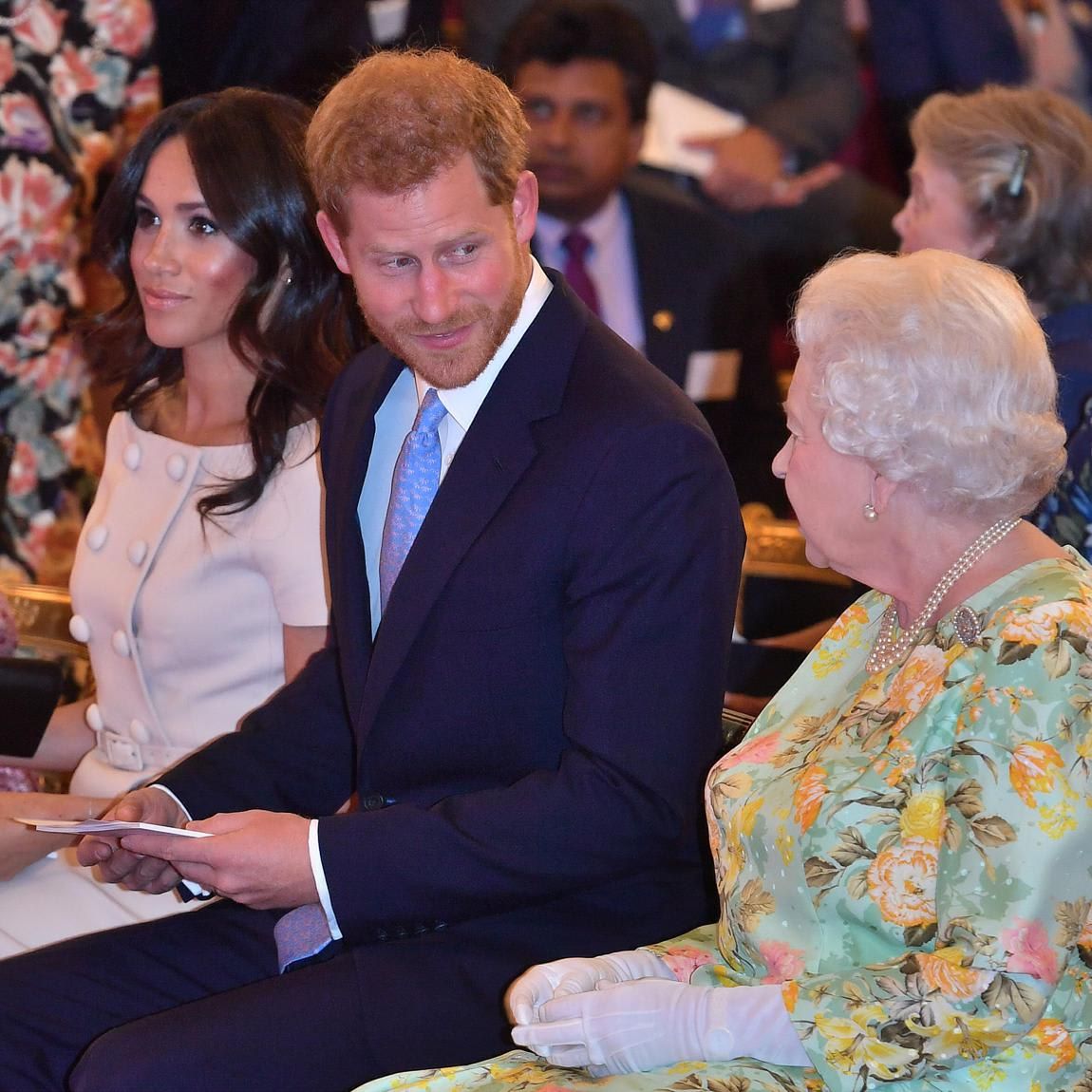 Queen Elizabeth II with Prince Harry, Duke of Sussex and Meghan, Duchess of Sussex at the Queen's Young Leaders Awards Ceremony