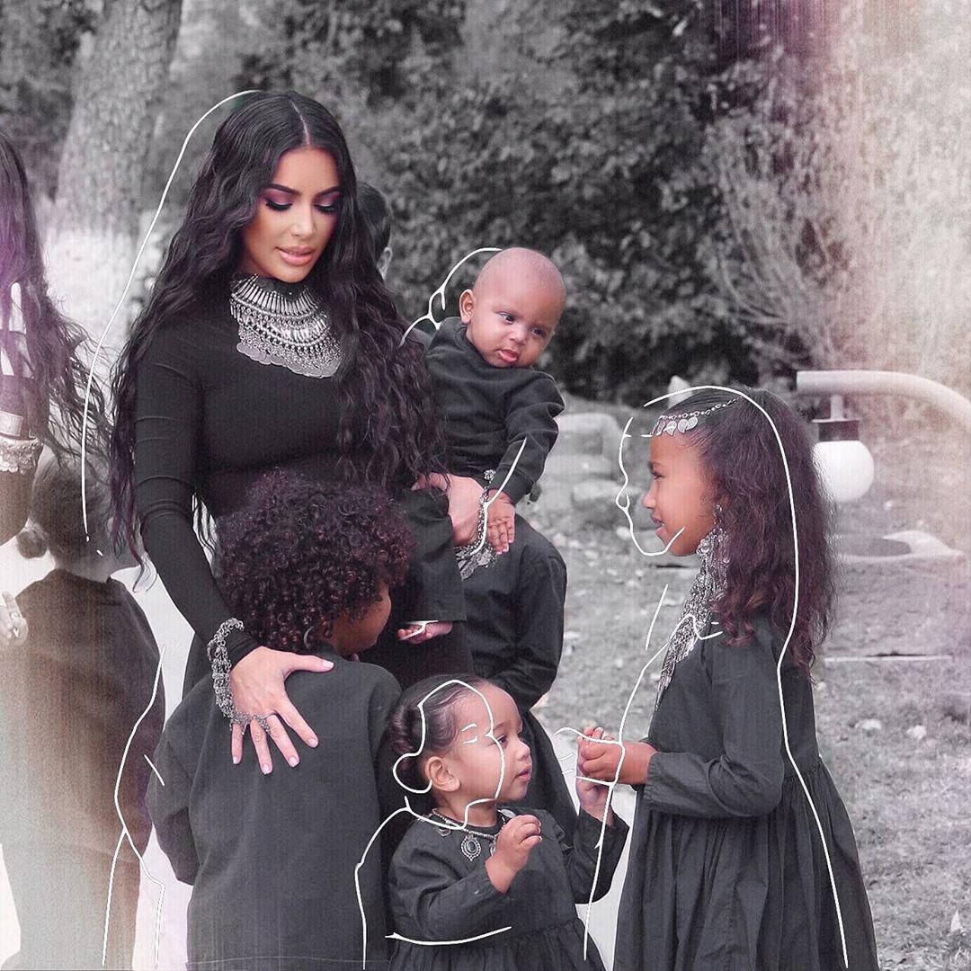 Kim Kardashian with her four kids