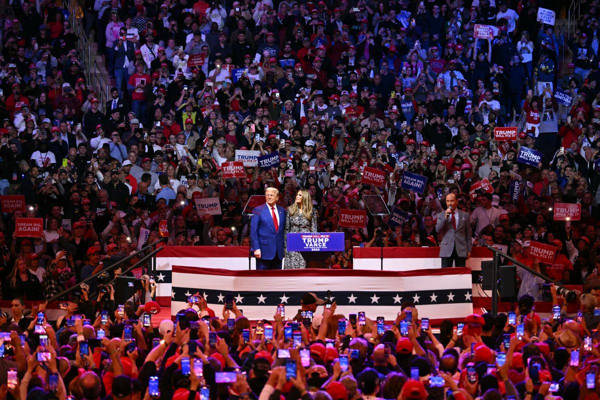 Former US President and Republican presidential candidate Donald Trump and his wife former First Lady Melania Trump stand on stage during a campaign at Madison Square Garden in New York, October 27, 2024. (Photo by ANGELA WEISS / AFP) (Photo by ANGELA WEISS/AFP via Getty Images)