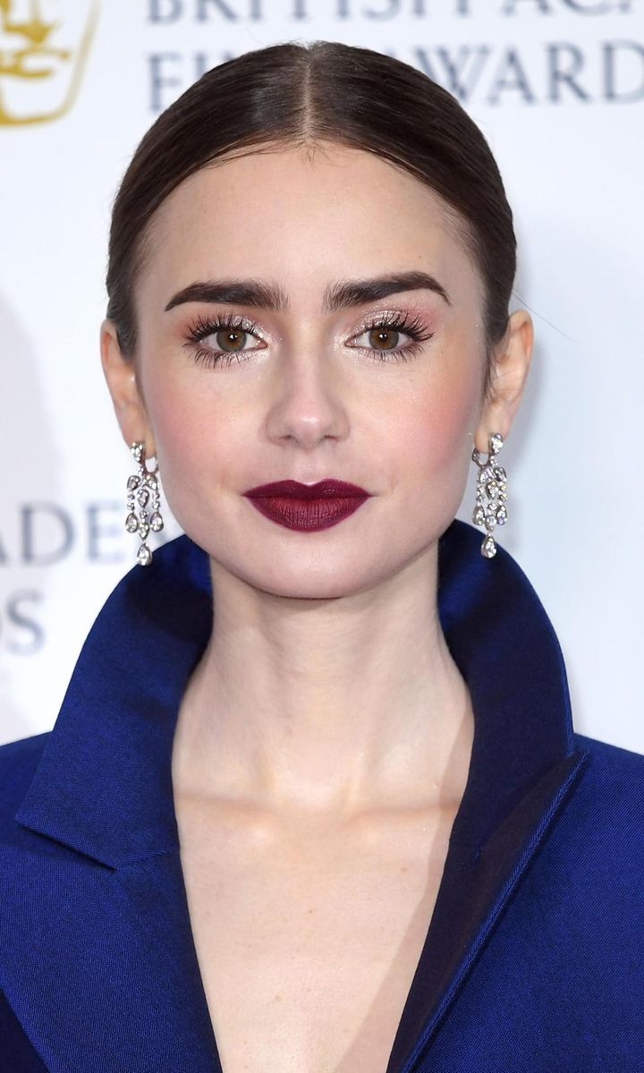 Lily Collins with her hair up