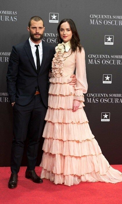 February 8: Dakota Johnson was layered in Gucci as she stood next to Jamie Dornan during the <i>Fifty Shades Darker</i> premiere in Madrid.
Photo: Carlos Alvarez/Getty Images