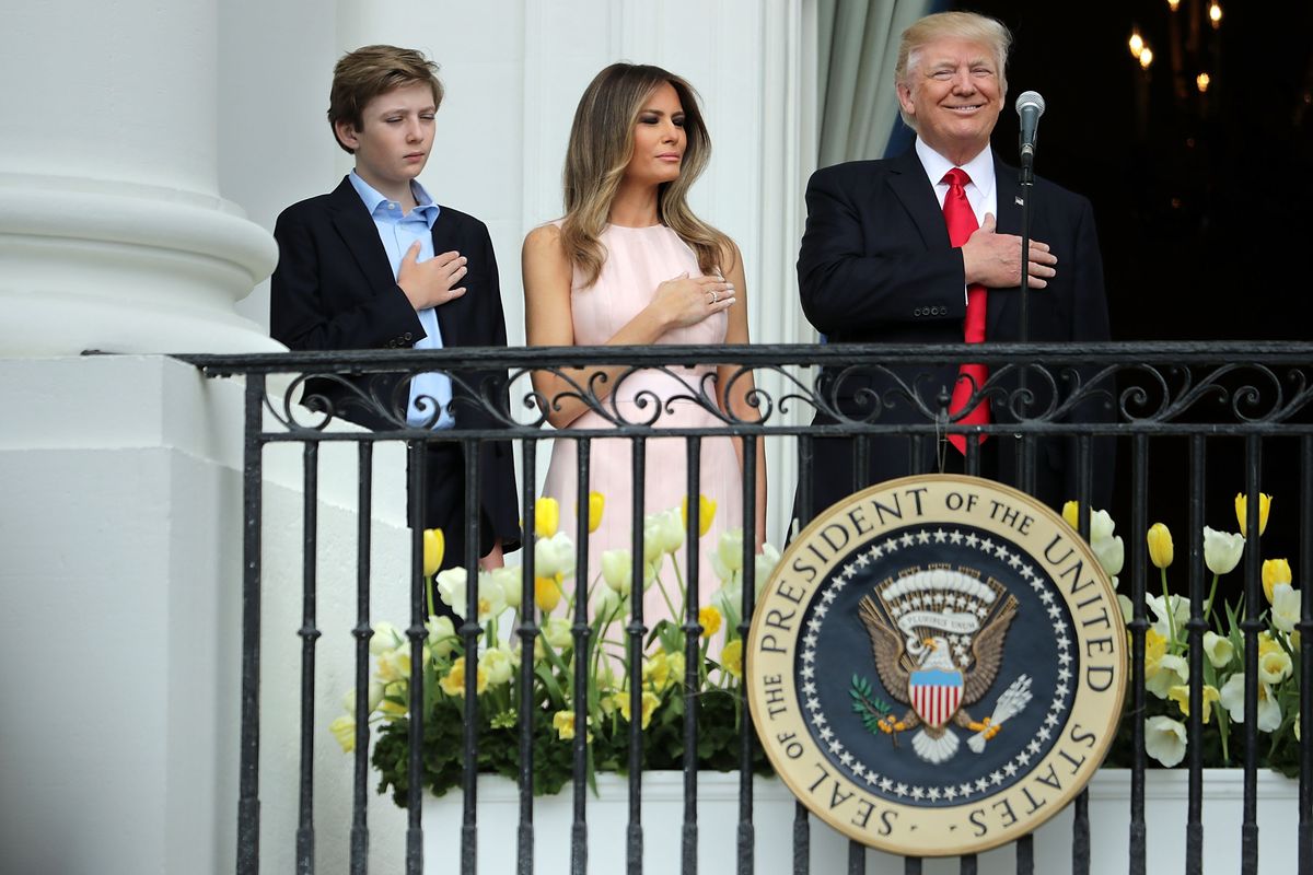 Barron Trump and his parents Melania and Donald Trump at the White House