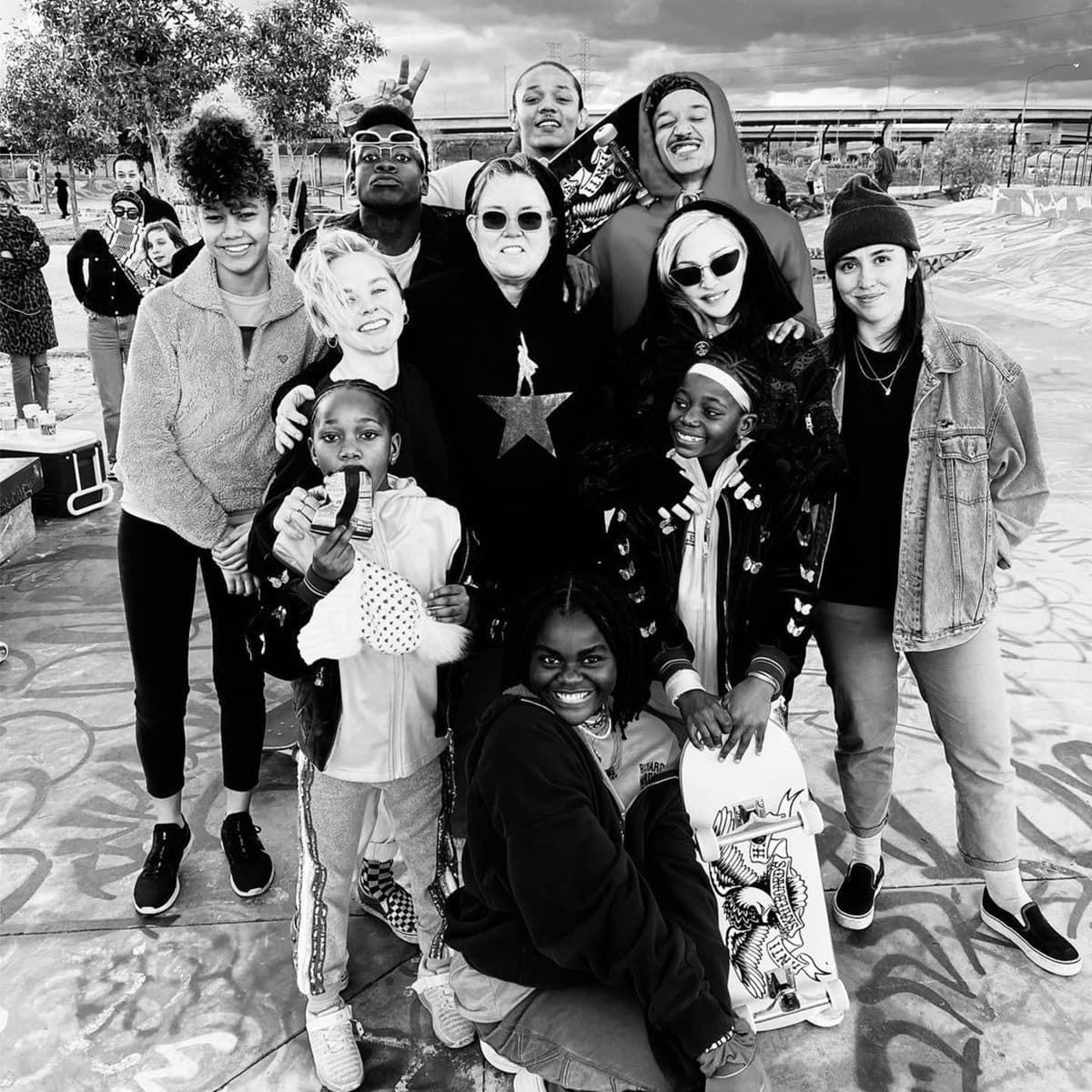 Rosie O'Donnell posing with Madonna for daughter's 15th birthday. Posing in a group at skateboard park,