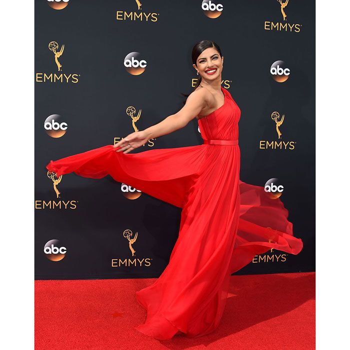 Dresses in motion! Whether it's thanks to the wind, great posing skills or simply the impromptu excitement of the moment, these red carpet twirls are among the best in Hollywood.
No one had more fun with their 2016 Emmys look than <a href="https://us.hellomagazine.com/tags/1/Priyanka-Chopra/"><strong>Priyanka Chopra</strong></a>. The <i>Quantico</i> star looked red hot as she twirled her custom Jason Wu gown down the carpet.
Photo: ROBYN BECK/AFP/Getty Images