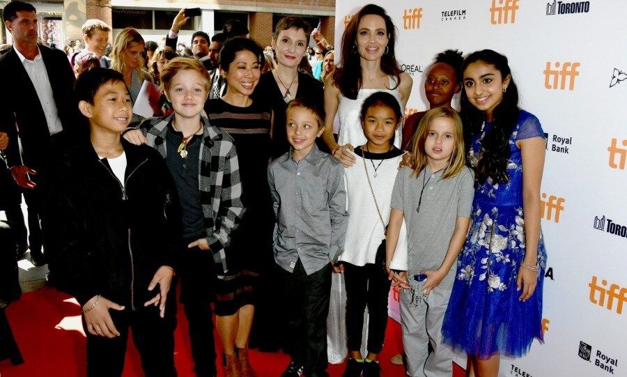 Full house! Angelina Jolie brought some of her kids to the premiere of <i>The Breadwinner</i> at the Winter Garden Theatre on September 10. The actress and director posed on the red carpet with Zahara, 12, Shiloh, 11, and her nine-year-old twins Knox and Vivienne.
Also present was actress Saara Chaudry and the film's director Nora Twomey. Stars of Angelina's Netflix film, <i>First They Killed My Father</i>, Kimhak Mun and Sareum Srey Moch, were also seen, as well as the author Loung Ung.
Photo: George Pimentel/WireImage