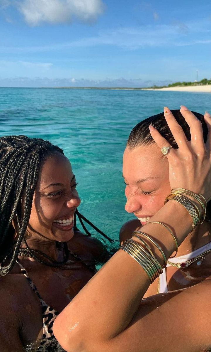 Bella Hadid and her friend Fanny Bourdette Donon smiling