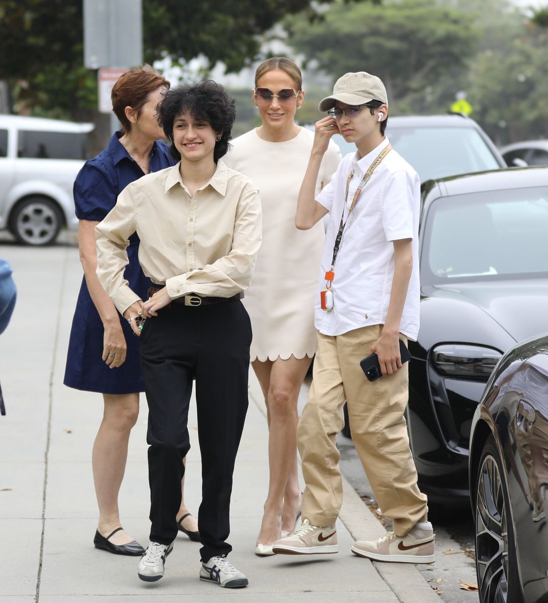 Jennifer Lopez arrives at Sam Affleck's graduation with her twins Max and Emme. 