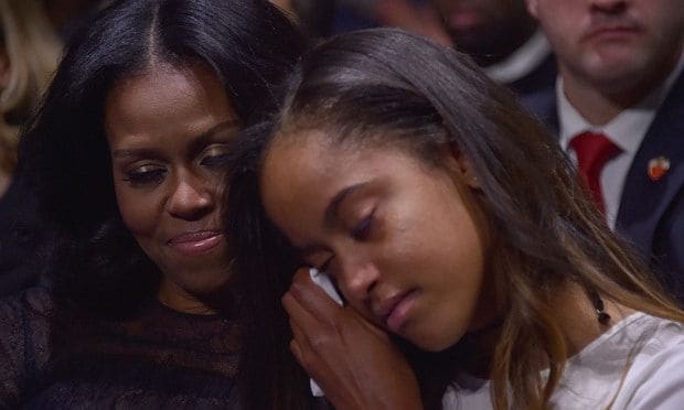 Michelle was seen comforting daughter Malia, 18, during the address.
Photo: Getty Images