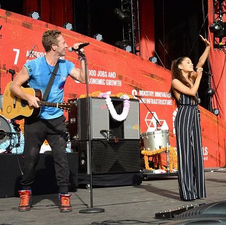 Ariana Grande was the first surprise of the day when she joined Coldplay on stage for a performance of "Just A Little Bit of Your Heart."
<br>
Photo: Getty Images