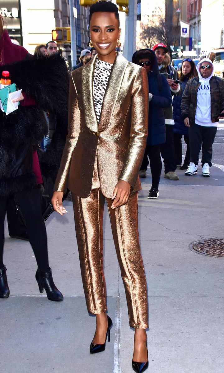 Miss Universe 2019, Zozibini Tunzi, in a glitter pantsuit by Ramy Brook , dalmation print top and black pumps